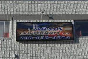 J Adams Sign Can